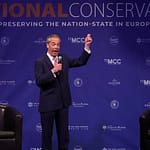 Nigel Farage speaking at the National Conservatism Conference